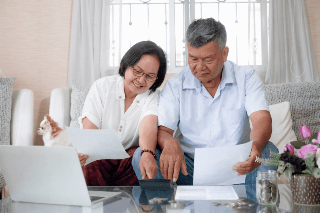 Image of a married couple in Singapore calculating the ABSD for their new property purchase