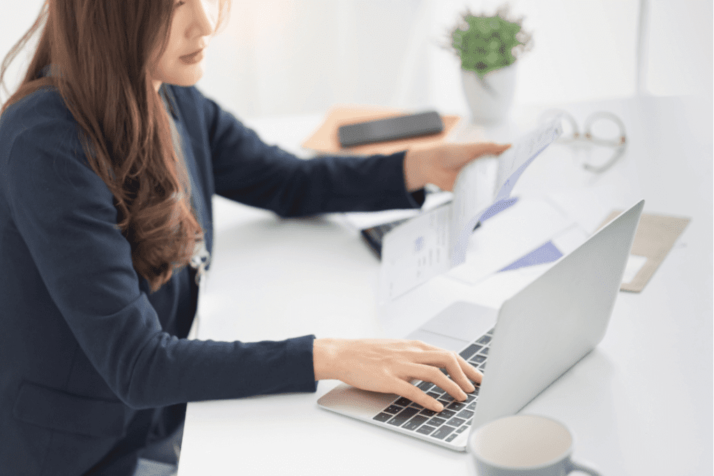 Woman looking through the TDSR requirements in preparation for her home loan application in Singapore