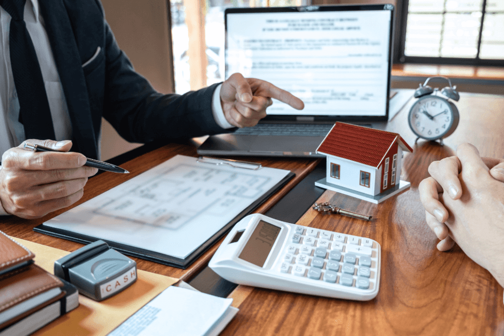 Image of a home financing advisor advising a homeowner on home loan packages in Singapore