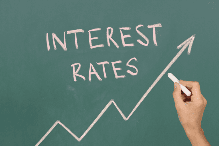 Featured image chalkboard with the word interest rates and an arrowing going upwards to symbolising the rising home loan interest rates in Singapore